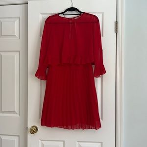 Red pleated dress